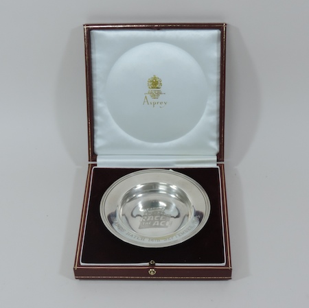 An Asprey silver plated pin tray, with i