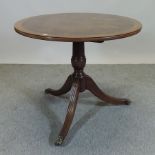 A good quality reproduction walnut centr