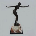 An Art Deco style bronze figure of a lad