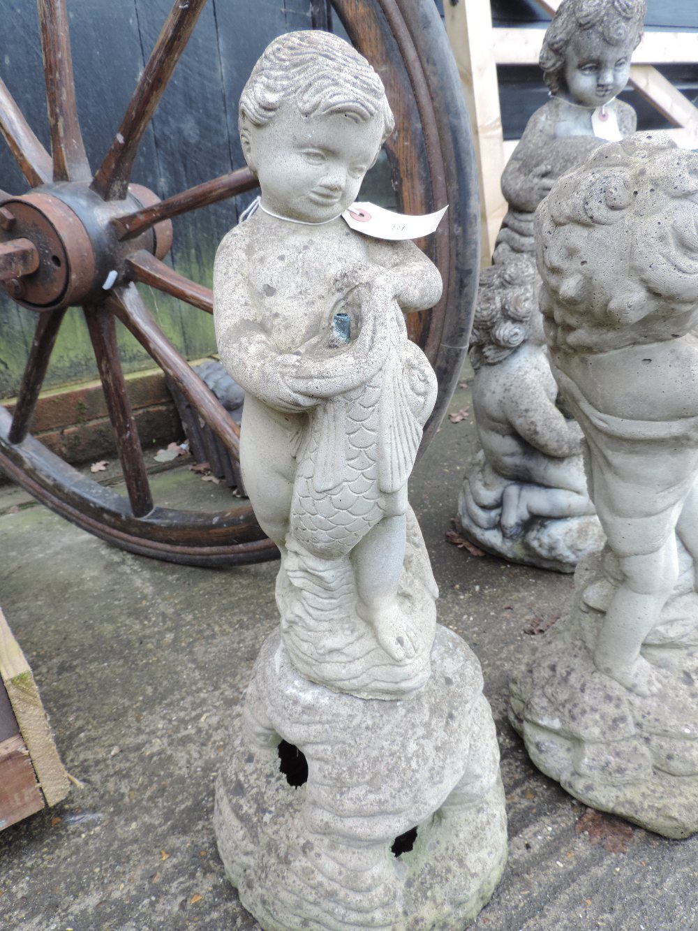 A reconstituted stone figural garden fou - Image 6 of 8