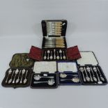 A set of silver teaspoons, cased, togeth
