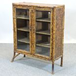 A Victorian bamboo glazed dwarf bookcase