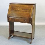 A 1920's oak student bureau, 75cm