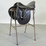 A Lovatt and Ricketts leather saddle, to