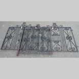 A pair of wrought iron gates, together w