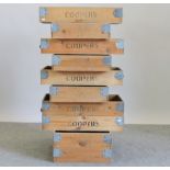 A collection of eight wooden fruit boxes