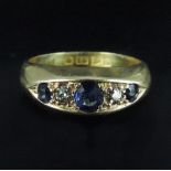 An 18 carat gold sapphire and diamond ri