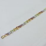 A coloured gemstone bracelet, set with p