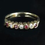 A 9 carat gold diamond and ruby seven st
