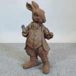 A cast iron garden figure, Mr Rabbit, 45
