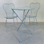 A blue painted metal garden table, 60cm