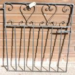 A black wrought iron garden gate, 87 x 9