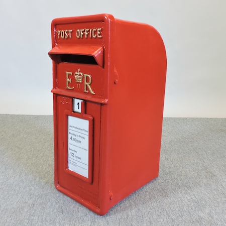 A reproduction postbox, 60cm tall