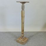 A pine jardiniere stand, 112cm