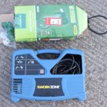 A Workzone portable compressor, together