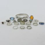 A collection of silver rings and bands,