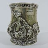 An early 20th century silver cup, relief