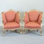A pair of French style gilt and red upho
