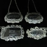 A pair of silver decanter labels inscrib