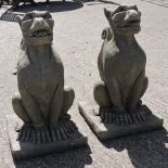 A pair of reconstituted stone models of