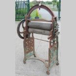 An early 20th century cast iron mangle,