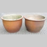 A pair of pottery circular planters, 32c