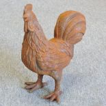 A cast iron model of a hen, 31cm tall