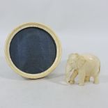 An early 20th century ivory circular pho