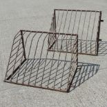 A metal hay rack, 90cm, together with an
