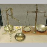 A pair of brass balance scales, by Doyle