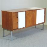 A 1970's teak and laminated sideboard,