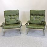 A pair of 1970's tubular chrome cantilever armchairs,