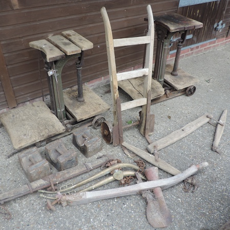 An early 20th century set of sack scales, 85cm tall, together with another similar, three weights, - Image 2 of 2