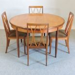 A 1960's teak G Plan extending dining table, 163 x 120cm overall,