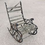 A cast iron and slatted hardwood garden rocking chair