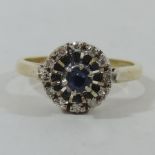 An 18 carat gold Art Deco style sapphire and diamond ring