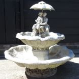 A reconstituted stone two tier water fountain,