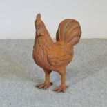 A cast iron model of a hen,