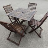 A teak folding garden table, 85cm,