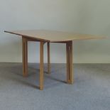 A modern oak rectangular dining table, 134 x 60cm,