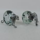 A glass and white metal mounted napkin ring, in the form of an elephant,