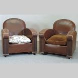 A pair of Art Deco brown upholstered club armchairs