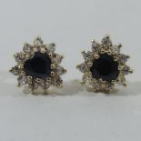 A pair of 9 carat gold gem set earrings,