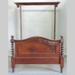 A Victorian mahogany half tester double bedstead,