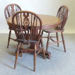 A Victorian walnut circular dining table, 96cm diameter,