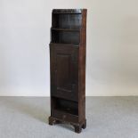 A 19th century dark oak dwarf cabinet,