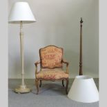 A 20th century upholstered open armchair,