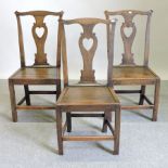 A set of three 18th century oak dining chairs