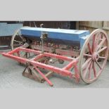 A mid 20th century seed drill, James Smyth & Sons Ltd, Peasenhall, Suffolk,