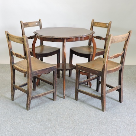 A set of four late George III bar back dining chairs,